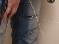 Boy pulls down his pants to take a much needed pee after drinking too much